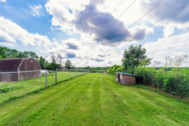 1163 Bowen Rd, Mansfield, OH 44903 - view of yard featuring a barn, an outdoor structure, and a rural view