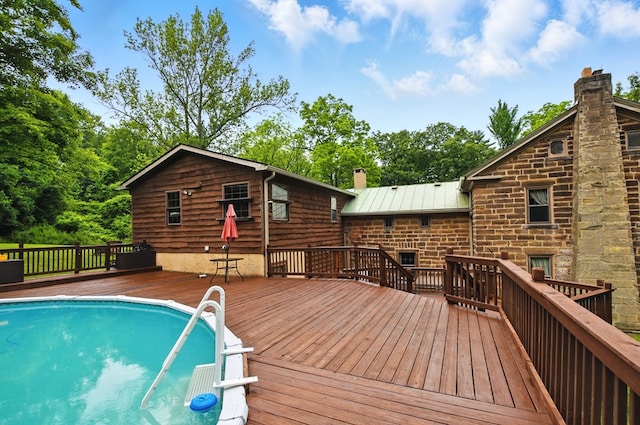 291 N Stewart Rd, Mansfield, OH 44905 - view of pool featuring a deck and view of wooded area