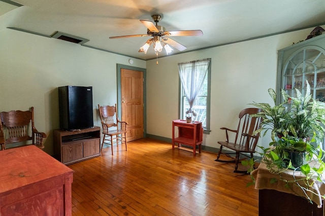 780 Pulver List Rd, Mansfield, OH 44905 - sitting room featuring hardwood / wood-style floors, ceiling fan, and ornamental molding