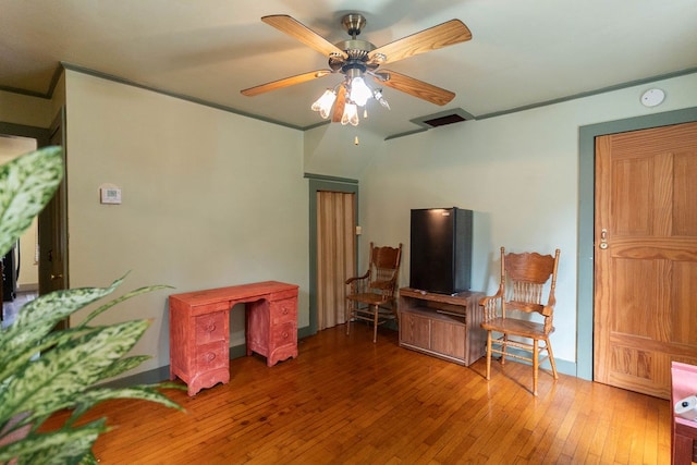 780 Pulver List Rd, Mansfield, OH 44905 - living room with hardwood / wood-style flooring, ceiling fan, and ornamental molding