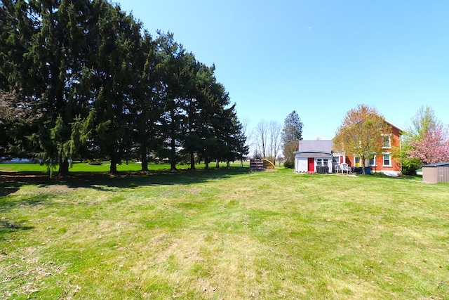 11914 State Route 269, Bellevue, OH 44811 - view of yard with an outdoor structure and a storage unit