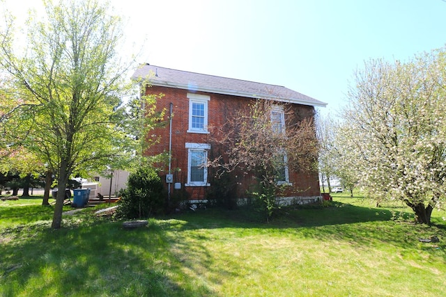11914 State Route 269, Bellevue, OH 44811 - view of front of house featuring a front lawn and brick siding