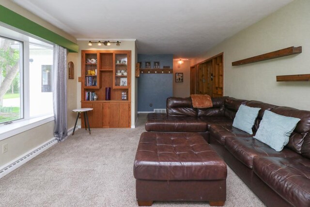 623 Bendle Ave, Shelby, OH 44875 - carpeted living room featuring track lighting and baseboards