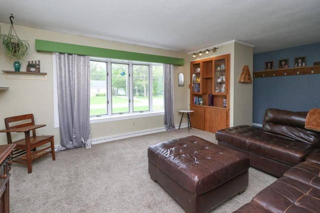 623 Bendle Ave, Shelby, OH 44875 - living room with a baseboard heating unit, carpet, and baseboards
