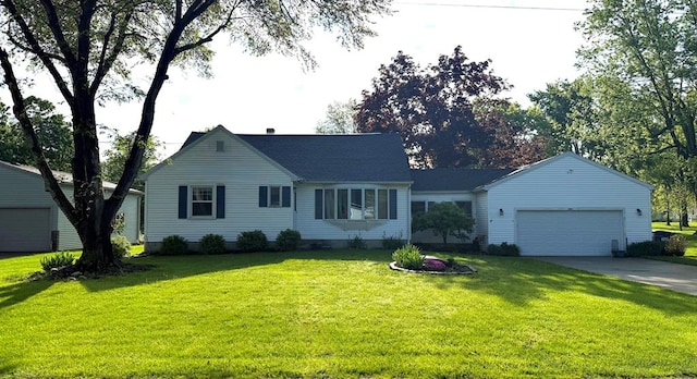 623 Bendle Ave, Shelby, OH 44875 - view of front of house featuring a garage, driveway, and a front lawn