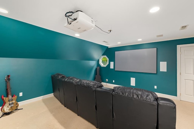cinema room with baseboards, lofted ceiling, and carpet floors