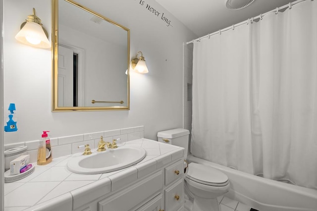 full bathroom with toilet, shower / bath combination with curtain, and vanity