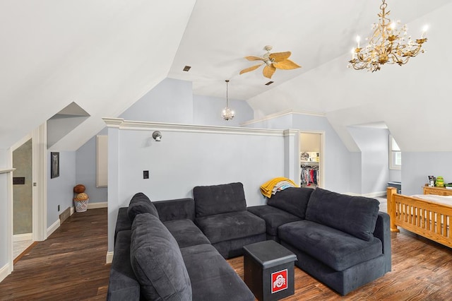 living room featuring ceiling fan with notable chandelier, lofted ceiling, wood finished floors, and baseboards