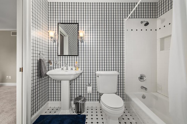 full bathroom with tile walls, visible vents, ornamental molding, toilet, and bathing tub / shower combination