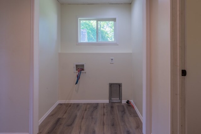 1676 Old Delaware Rd, Mount Vernon, OH 43050 - laundry area featuring hookup for a washing machine and wood finished floors