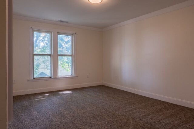1676 Old Delaware Rd, Mount Vernon, OH 43050 - spare room featuring baseboards and dark colored carpet