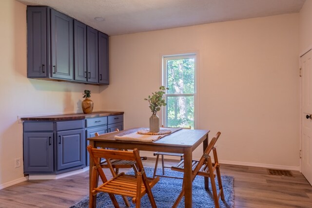 1676 Old Delaware Rd, Mount Vernon, OH 43050 - dining room featuring wood finished floors and baseboards