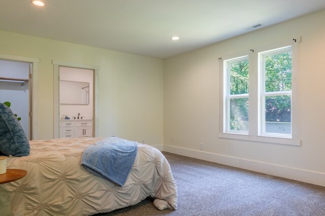 1676 Old Delaware Rd, Mount Vernon, OH 43050 - bedroom featuring carpet flooring, recessed lighting, and connected bathroom