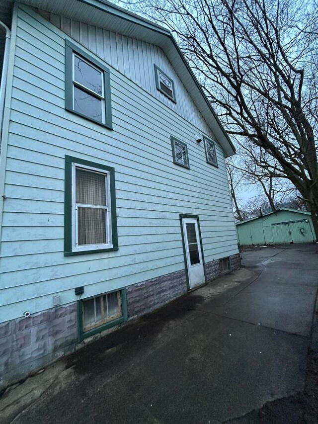 view of snow covered exterior featuring a porch