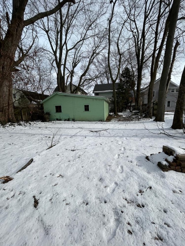 view of yard covered in snow