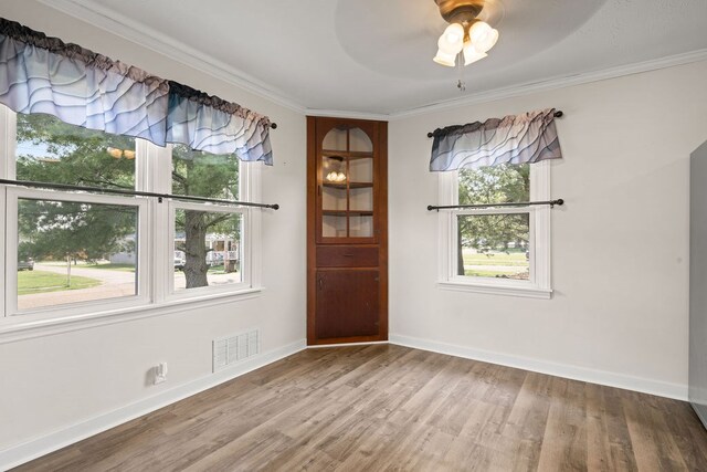 110 Hill St, Edison, OH 43320 - unfurnished room featuring wood finished floors, ceiling fan, and ornamental molding