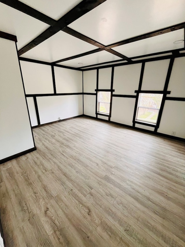328 Newman St, Mansfield, OH 44902 - bonus room with baseboards, wood finished floors, and beamed ceiling