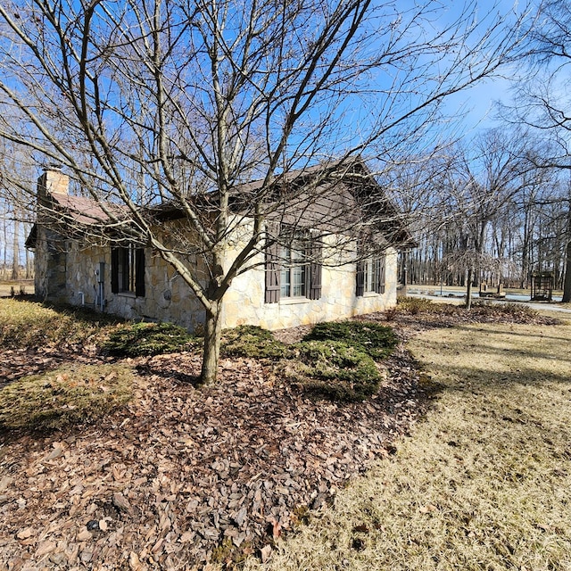 view of home's exterior with stone siding