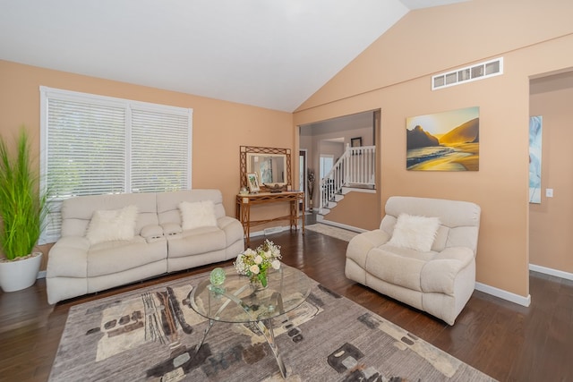 2453 Whitney Ave, Ontario, OH 44906 - living room with wood finished floors, vaulted ceiling, and stairway
