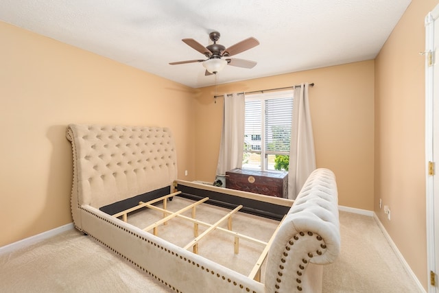 2453 Whitney Ave, Ontario, OH 44906 - carpeted bedroom featuring baseboards and a ceiling fan