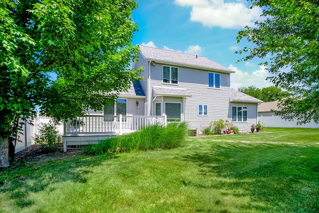 2453 Whitney Ave, Ontario, OH 44906 - rear view of property featuring a wooden deck and roof with shingles