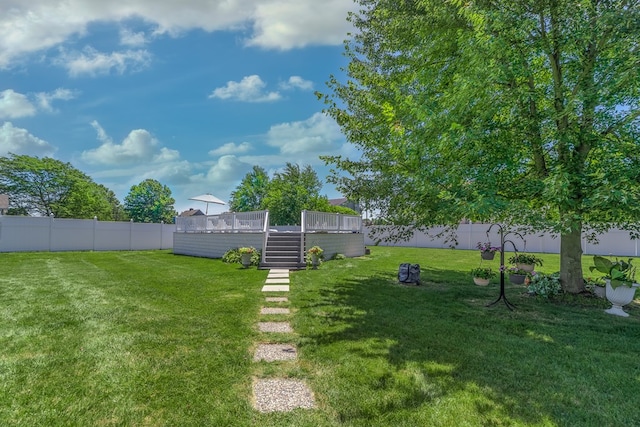 2453 Whitney Ave, Ontario, OH 44906 - fenced backyard with a wooden deck