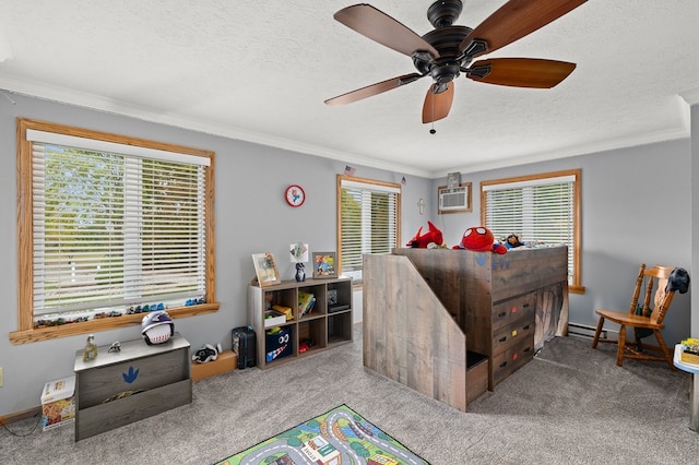 carpeted bedroom featuring a textured ceiling, ceiling fan, crown molding, and multiple windows