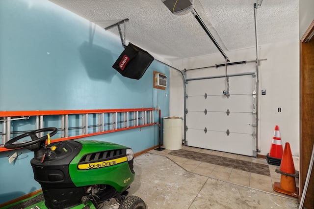 garage featuring a garage door opener and a wall mounted AC