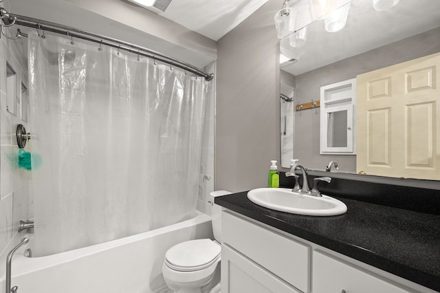 full bathroom featuring vanity, toilet, and shower / tub combo