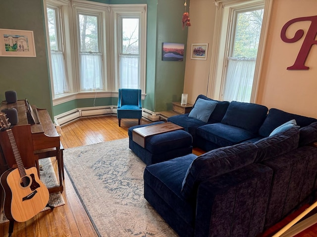 796 US Highway 224, Willard, OH 44890 - living area with hardwood / wood-style flooring and a baseboard radiator