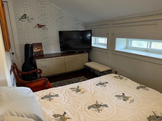 796 US Highway 224, Willard, OH 44890 - bedroom with dark wood finished floors, vaulted ceiling, and wallpapered walls