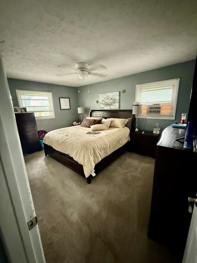 950 Woodbine St, Willard, OH 44890 - bedroom featuring carpet, a ceiling fan, and a textured ceiling