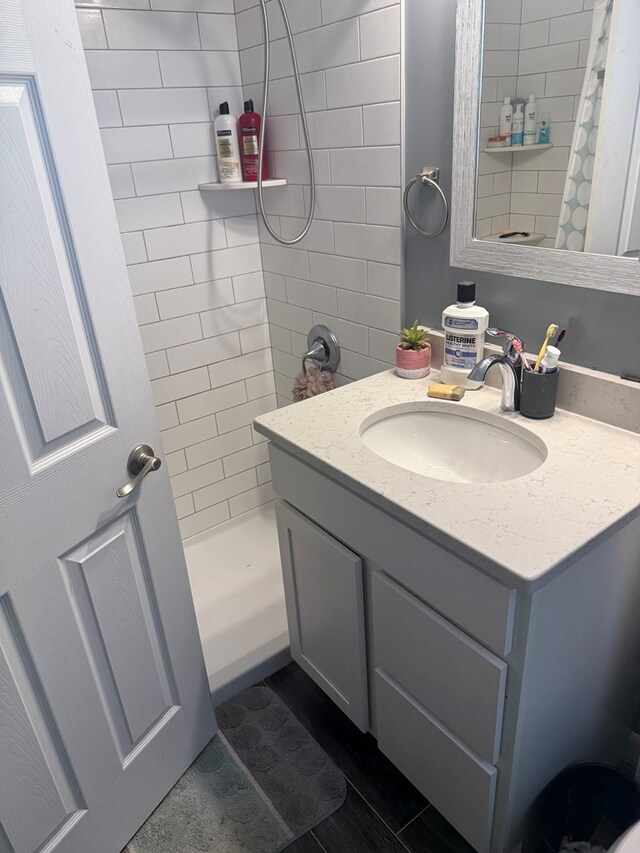 950 Woodbine St, Willard, OH 44890 - bathroom with a tile shower and vanity