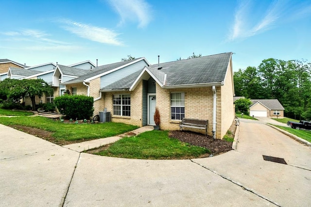 1696 Riva Rdg, Mansfield, OH 44904 - view of front of house with brick siding, roof with shingles, and a front lawn