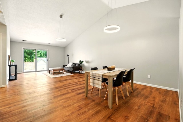 1696 Riva Rdg, Mansfield, OH 44904 - dining space featuring vaulted ceiling and wood finished floors