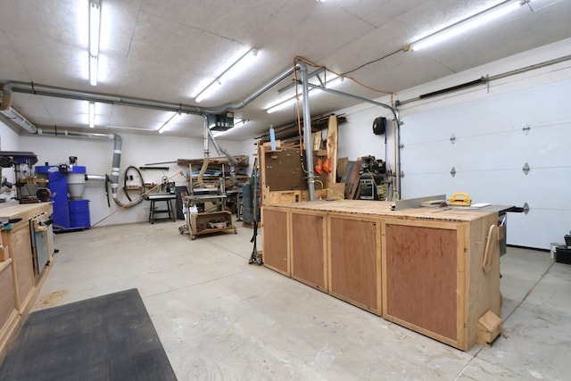 garage with a workshop area