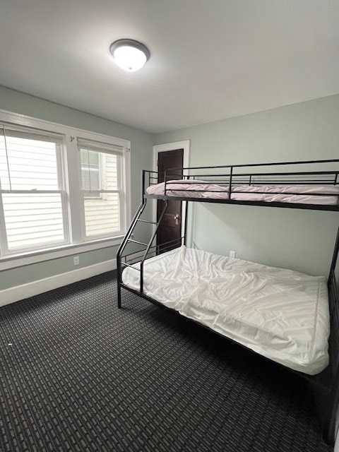 379 S Main St, Mansfield, OH 44902 - carpeted bedroom featuring baseboards