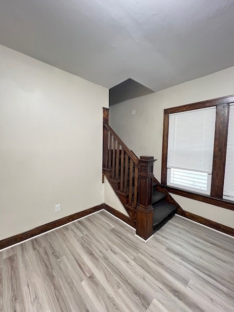 379 S Main St, Mansfield, OH 44902 - stairs featuring wood finished floors and baseboards