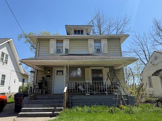 traditional style home with covered porch