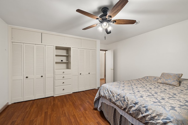 bedroom with ceiling fan, dark hardwood / wood-style floors, and a closet