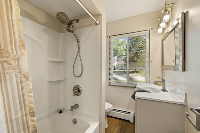 full bathroom with a baseboard radiator, bathing tub / shower combination, wood-type flooring, toilet, and vanity