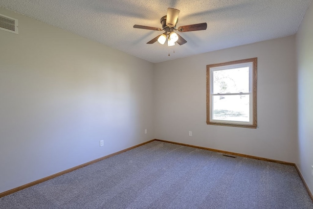 42 Kester Dr, Mount Vernon, OH 43050 - carpeted spare room featuring ceiling fan, baseboards, and a textured ceiling