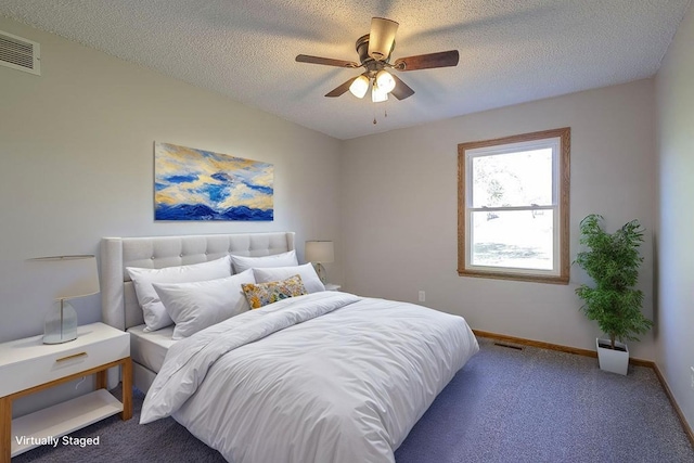 42 Kester Dr, Mount Vernon, OH 43050 - bedroom with carpet, baseboards, a textured ceiling, and ceiling fan