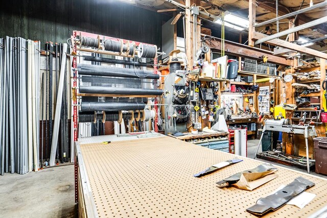 15 W Main St, Lexington, OH 44904 - miscellaneous room with a workshop area and concrete flooring