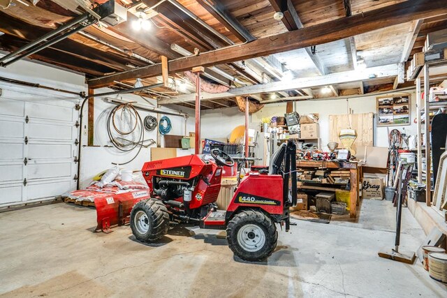 15 W Main St, Lexington, OH 44904 - garage featuring a workshop area