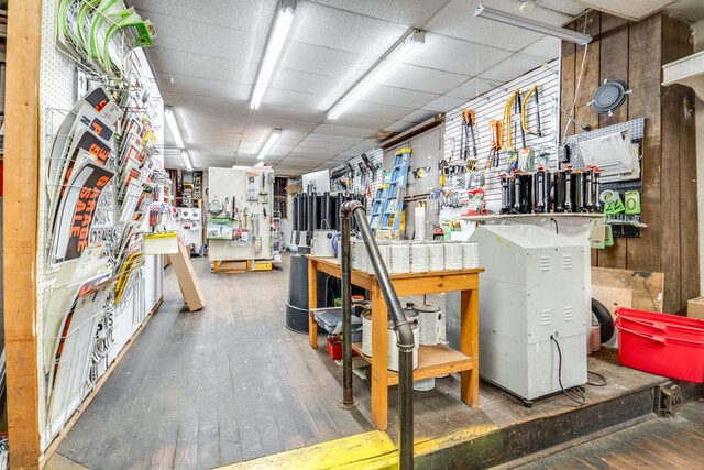 15 W Main St, Lexington, OH 44904 - miscellaneous room featuring hardwood / wood-style floors, a workshop area, and a drop ceiling