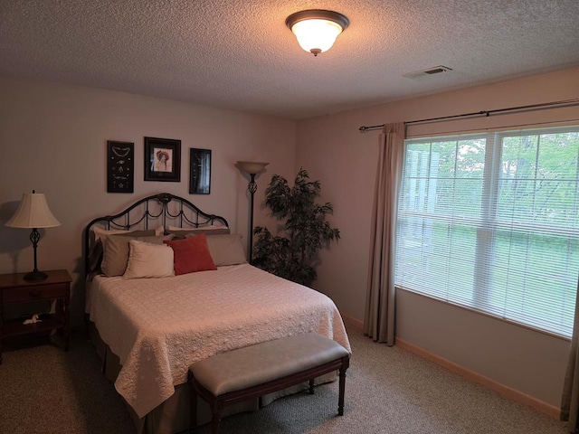 1683 Riva Ridge Dr, Mansfield, OH 44904 - bedroom with light carpet and a textured ceiling