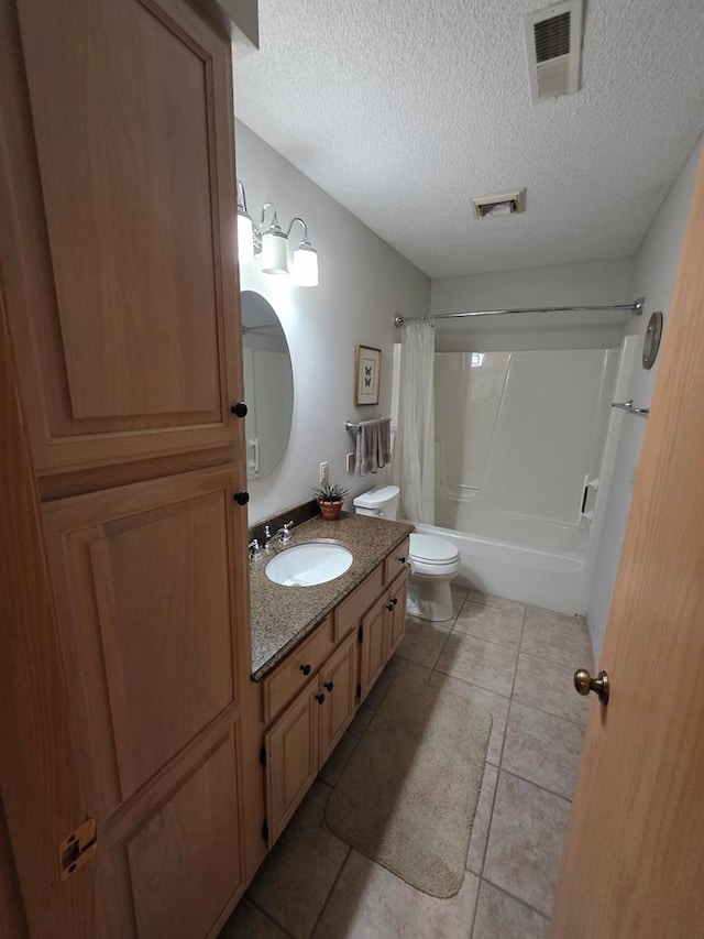 1683 Riva Ridge Dr, Mansfield, OH 44904 - bathroom with shower / tub combo with curtain, vanity, a textured ceiling, and tile patterned floors