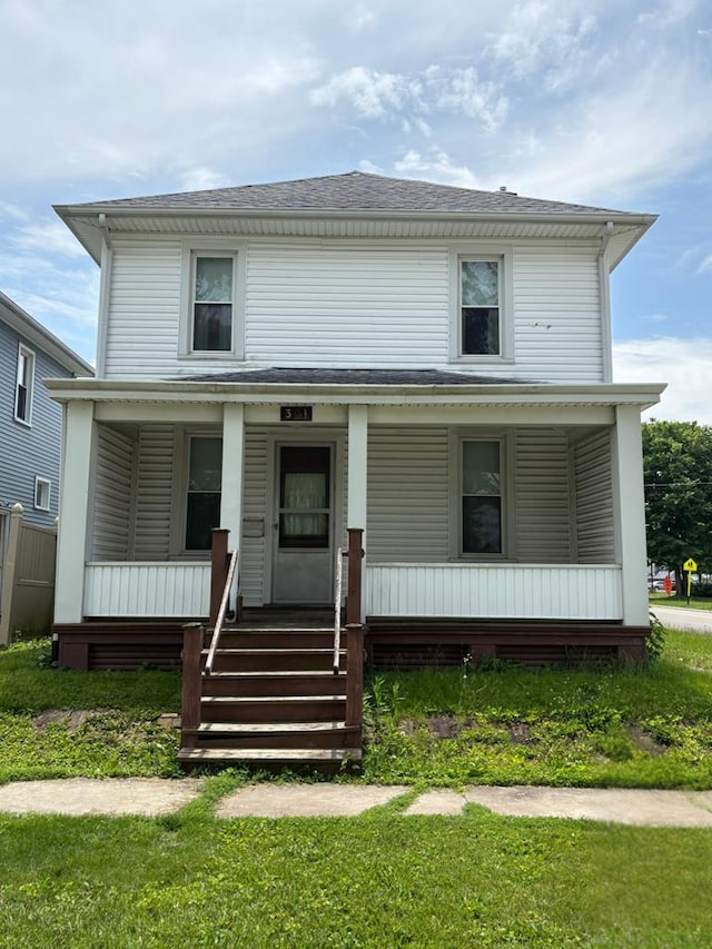 301 E Charles St, Bucyrus, OH 44820 - traditional style home with a porch