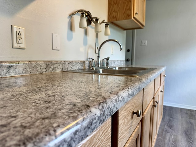184 Mason St, Mansfield, OH 44902 - kitchen featuring a sink and dark wood-style flooring